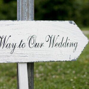 This Way to Our Wedding sign from artist on Etsy